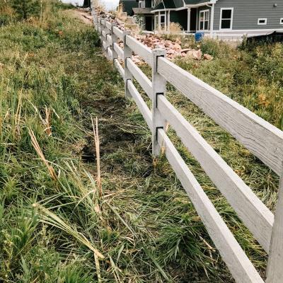 Concrete Split Rail Fence in Colorado Springs sub-division